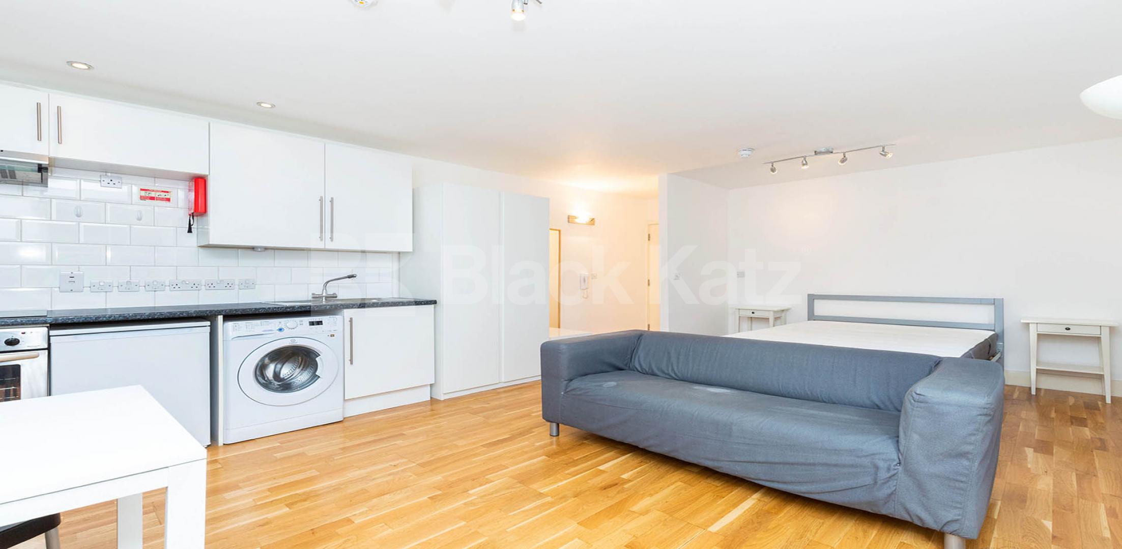 A fantastic spacious studio set within a gated double fronted house Camden Road , Camden Borders 